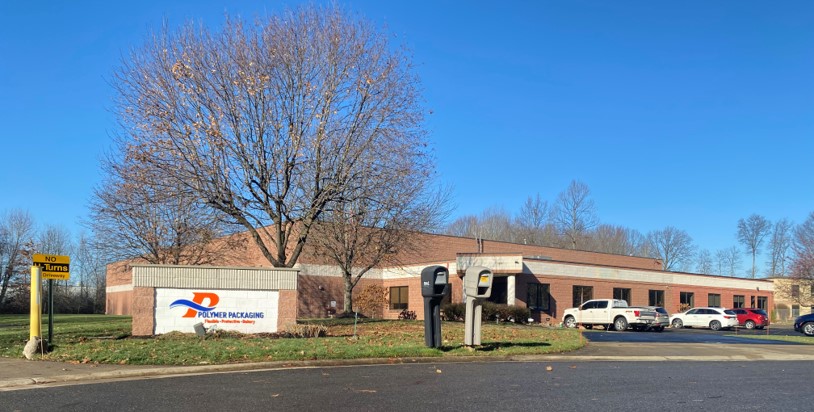 Front view of Polymer Packaging's main office building, showcasing the company’s headquarters.
