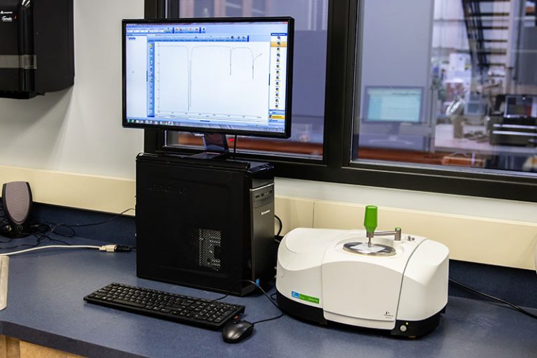 Haze meter testing equipment used to measure the clarity and optical properties of packaging materials.